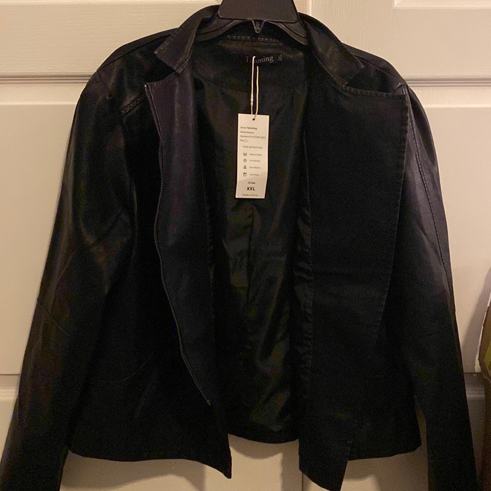 Brand new black jacket